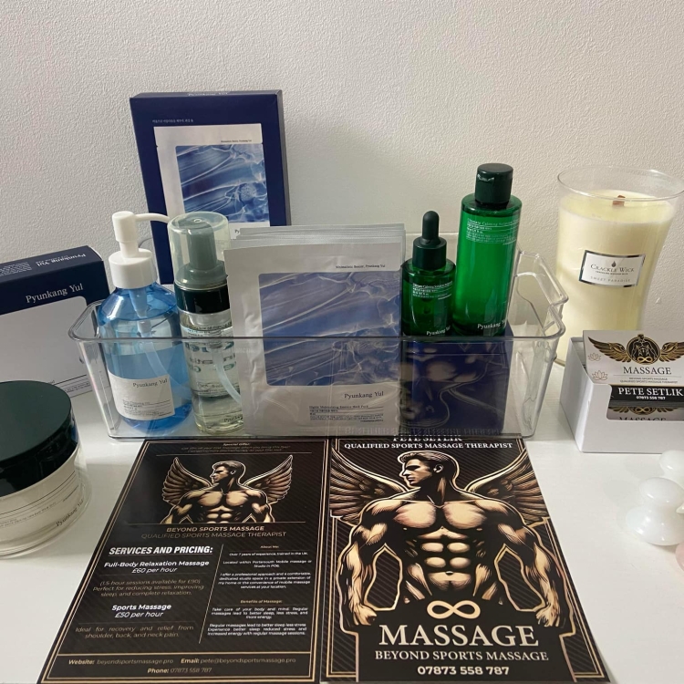 Desk in my studio with flower, products and my flyer